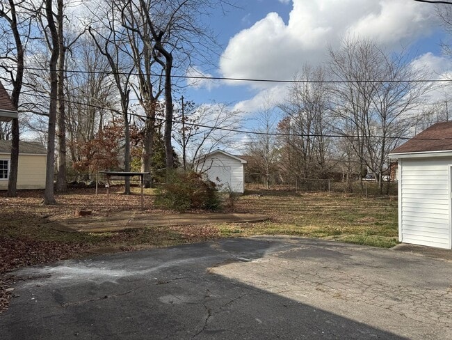 Building Photo - Timeless All-Brick Charm Near Madison St! 3 Bed 3 Bath with Detached Garage!