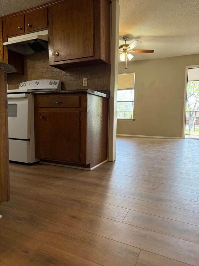 Building Photo - 1/1 NEW FLOORING ON-SITE LAUNDRY FACILITY-...