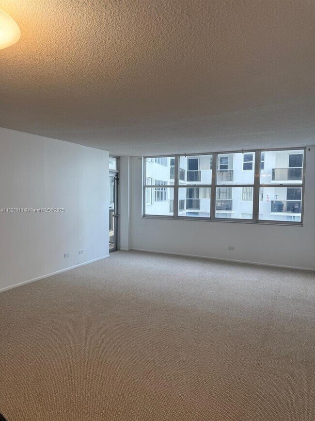 Building Photo - 6039 Collins Ave