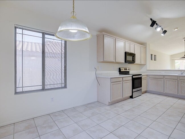 Building Photo - Spacious Living in a Gated Community with Resort-Style Amenities!