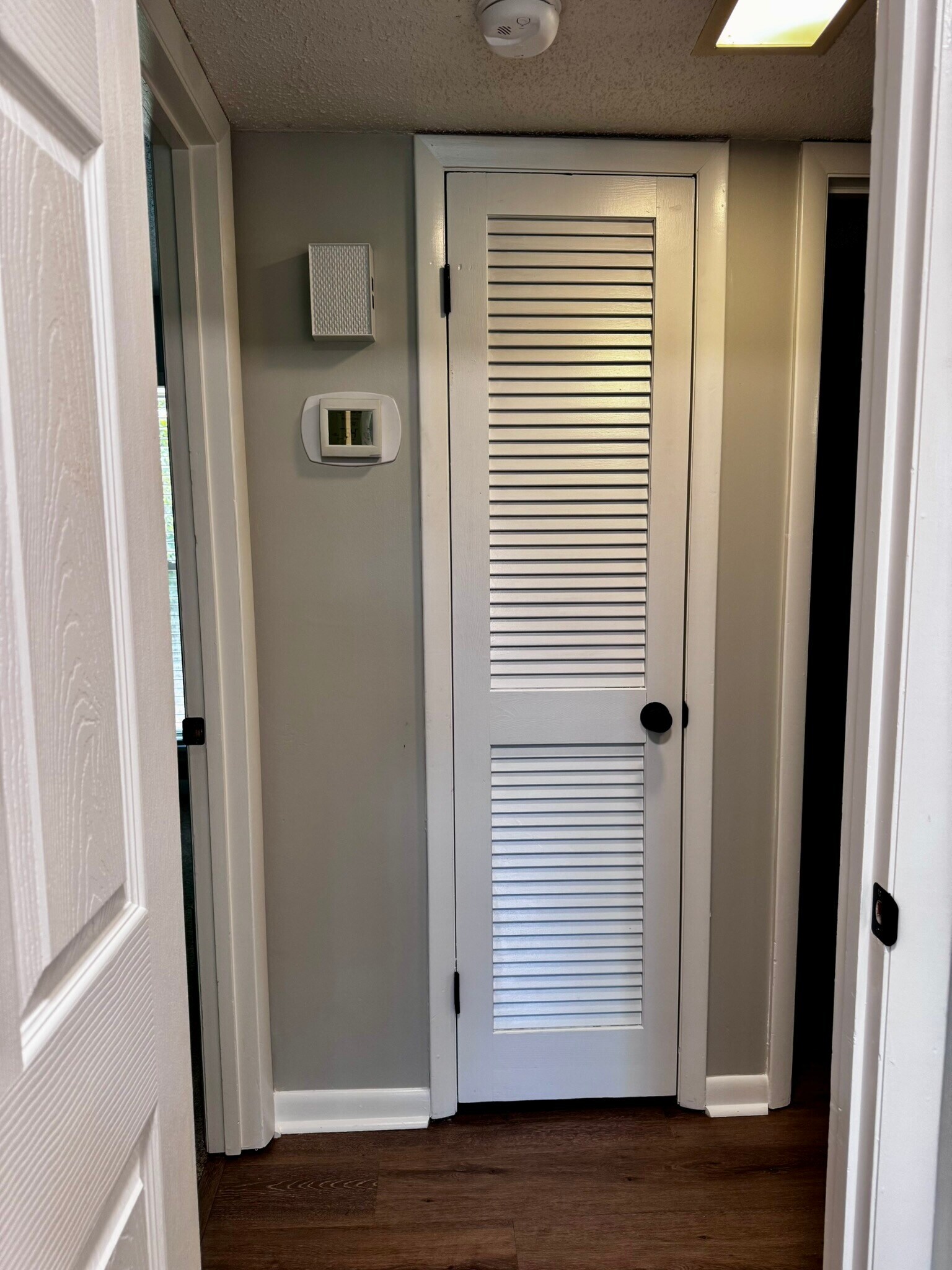 Utility closet. View from master bedroom. - 122 Turnwood Ln