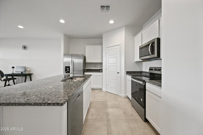 Building Photo - 38180 W Amalfi Ave