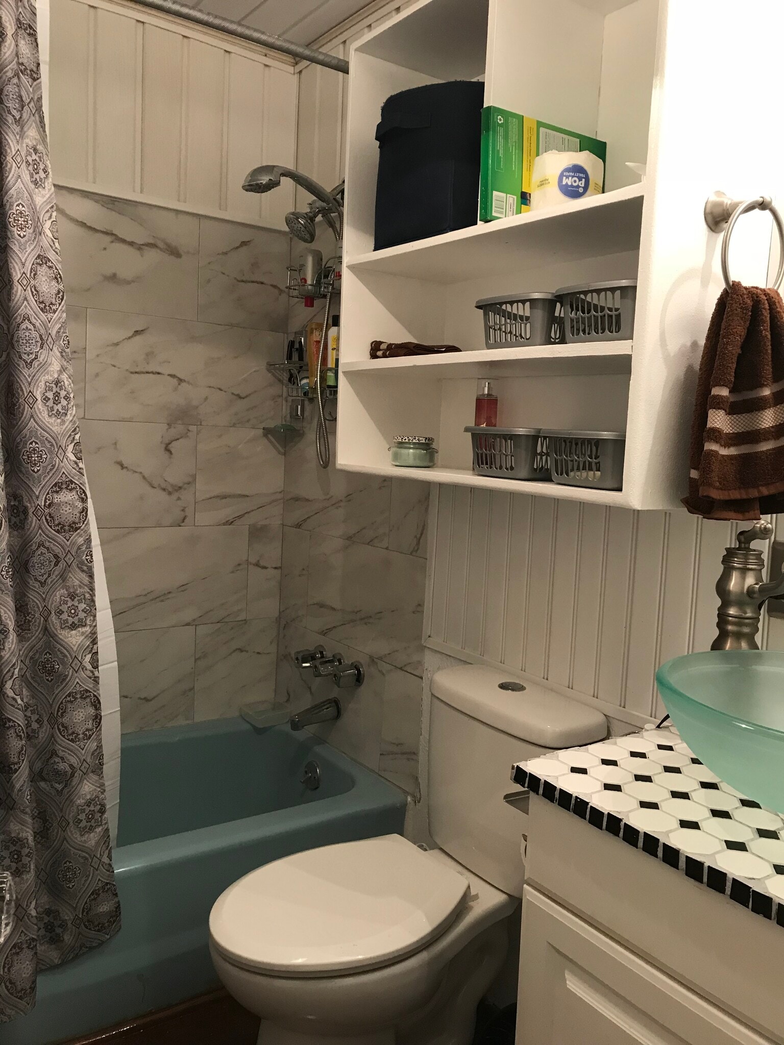 New ceramic tile tub surround with upgraded dual shower heads and new SS 2 shelf shower caddy - 1407 W Church St