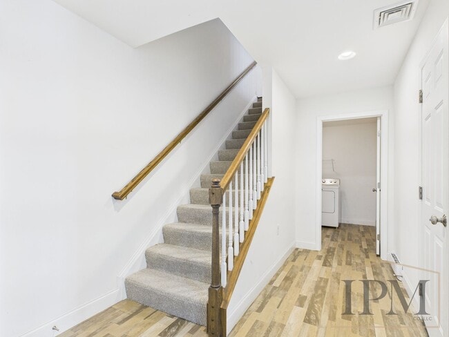 Building Photo - 2-bedroom 2.5 bath Luxury Townhome located...