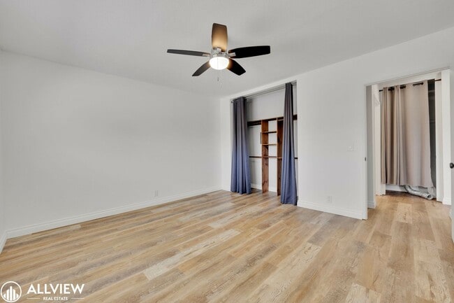 Building Photo - Modern 1-Bed Upstairs Condo with Garage & ...