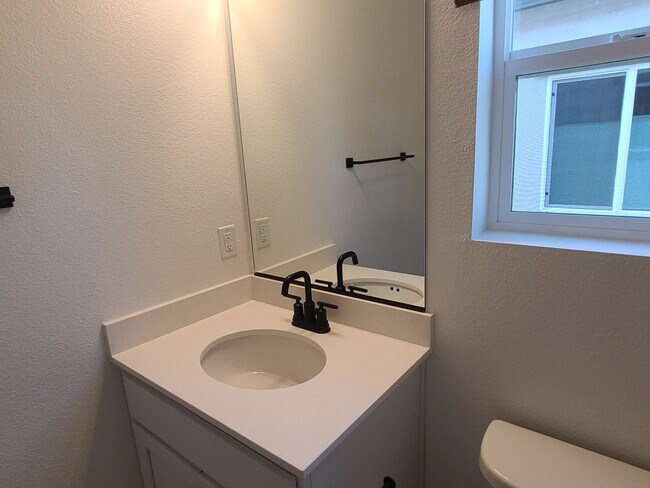 Building Photo - Three Bedroom Three Bathroom Home with Solar