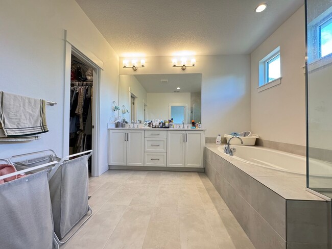 Building Photo - Modern and Immaculate 4-Bedroom Bethany Home with Designer Finishes and Fenced Yard