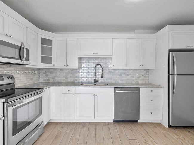 Building Photo - 9341 Collins Ave
