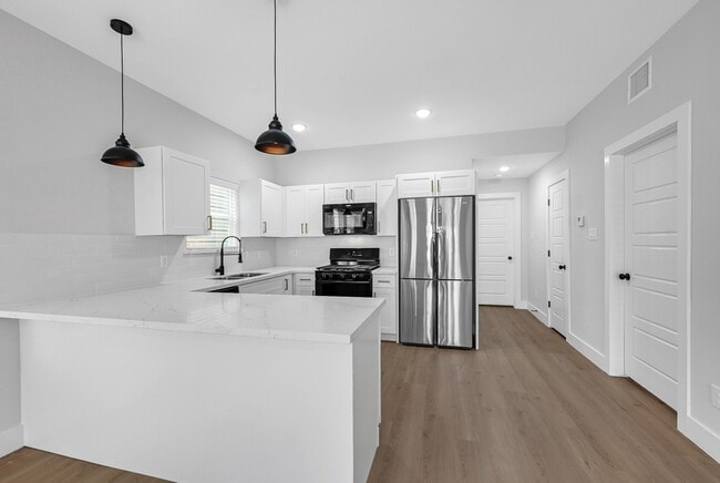 Building Photo - 3312 Bacchus St