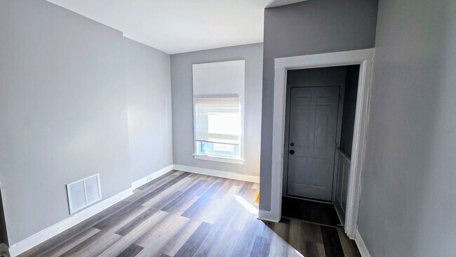 Building Photo - Beautiful Two Bedroom, Plus a Pass Through Room with a Fenced in Rear Patio