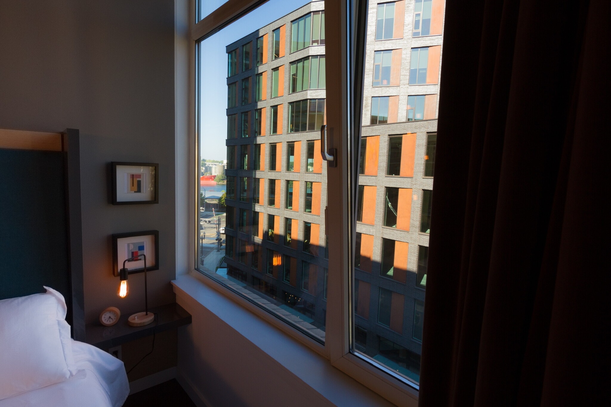 Large windows throughout. primary bedroom view to river - 1255 NW 9th Ave