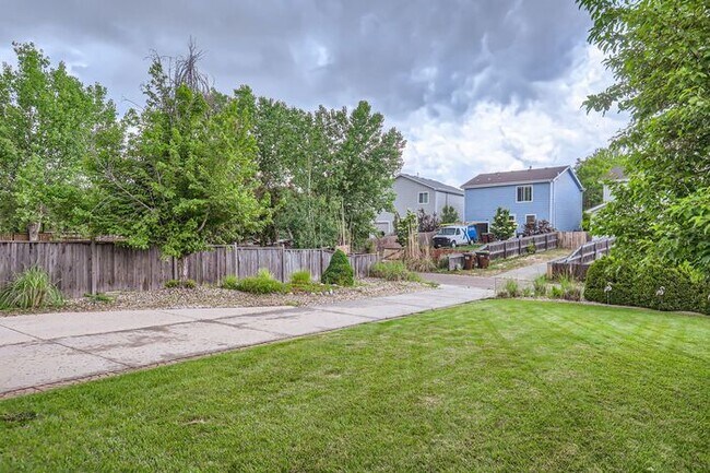 Building Photo - Updated 4-Bedroom with Serene Outdoor Spac...