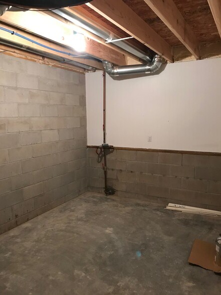 Lower level utility room provides loads of extra storage. - 1756 St Joseph St