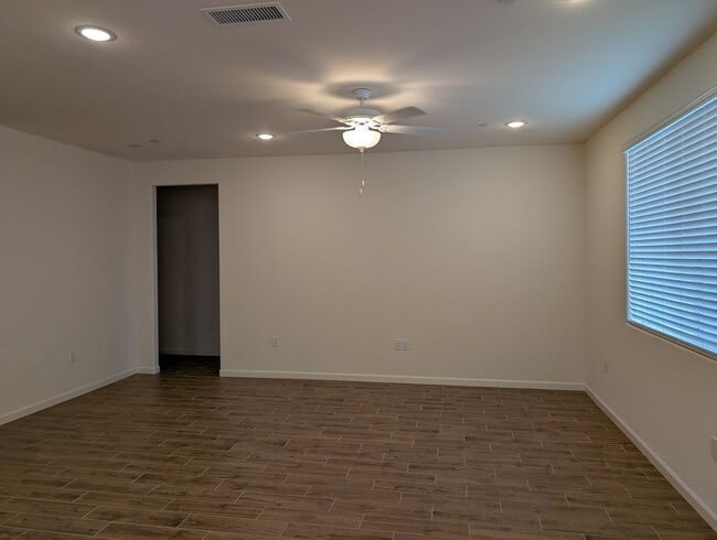 Building Photo - New Wilson home offering modern amenities, solar and a nice floor plan. Bonus room with den or of...