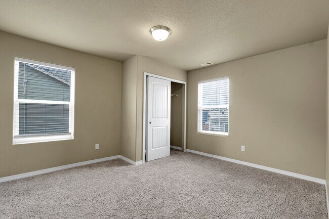 Building Photo - $2,490.95 - 4 Bed, 2.5 Bath Home in CO Springs with Fenced in Yard and 3 Car Garage!