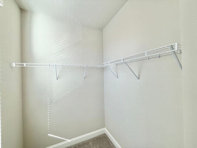 Building Photo - Stunning New Construction 2BD, 2.5BA Cary Townhome-Style Condo with a 1-Car Garage & Bonus Flex S...