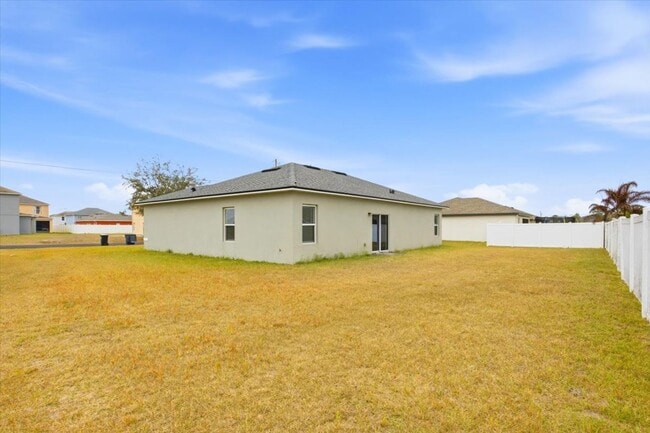 Building Photo - Stunning 4-Bedroom, 2-Bath Home in Poinciana with Modern Upgrades