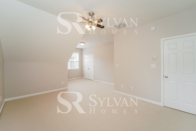 Building Photo - Welcome to this charming abode.
