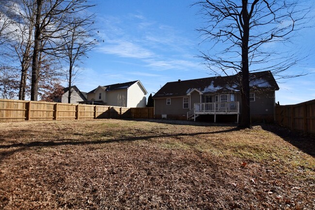 Building Photo - Pet Friendly Three Bedroom with Bonus!