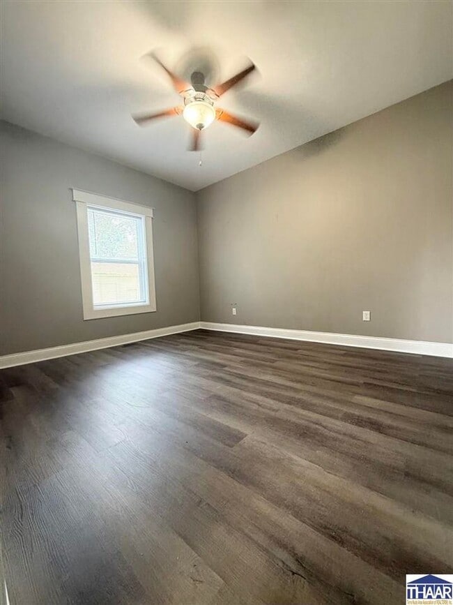Building Photo - Renovated 3-Bedroom Home Steps from the 12...