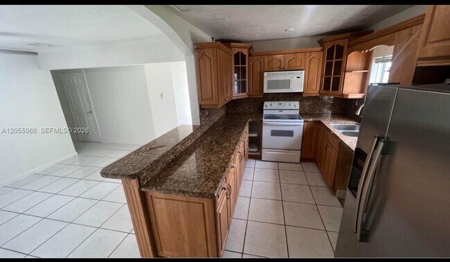 Building Photo - 17201 NW 53rd Ave