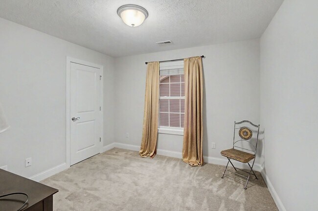 Building Photo - Spacious 4-Bedroom, 3.5-Bathroom Townhome & 2-Car Garage-West Champaign