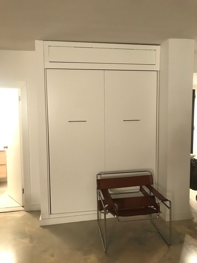 Queen size wall bed for guests - 1620 E Broad St