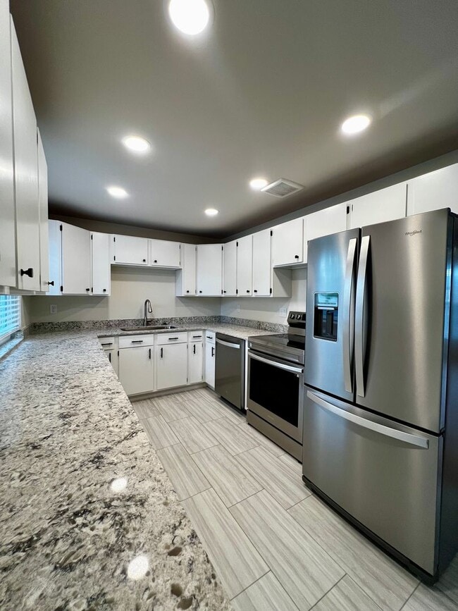Building Photo - Non-Refundable & Security Deposit Total: $2400.00