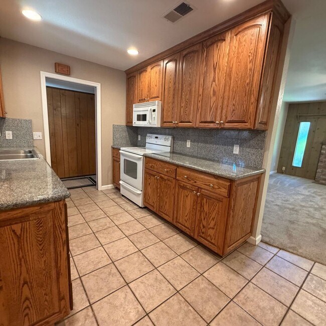 Building Photo - Adorable house with large deck,  yard and RV access