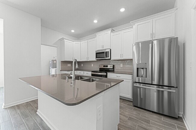 Building Photo - Available on July 10! Solar panel Spacious 3 bedroom house with all appliances included.