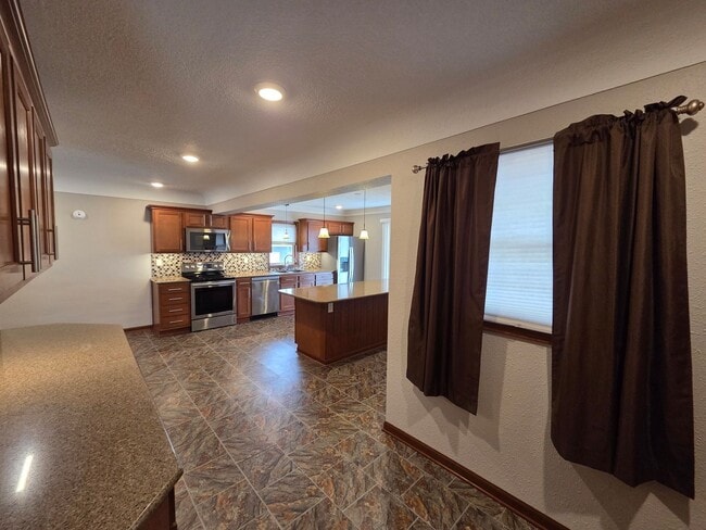 Building Photo - Well-Maintained 3BR Home – Garage + Washer/Dryer, dishwasher Included