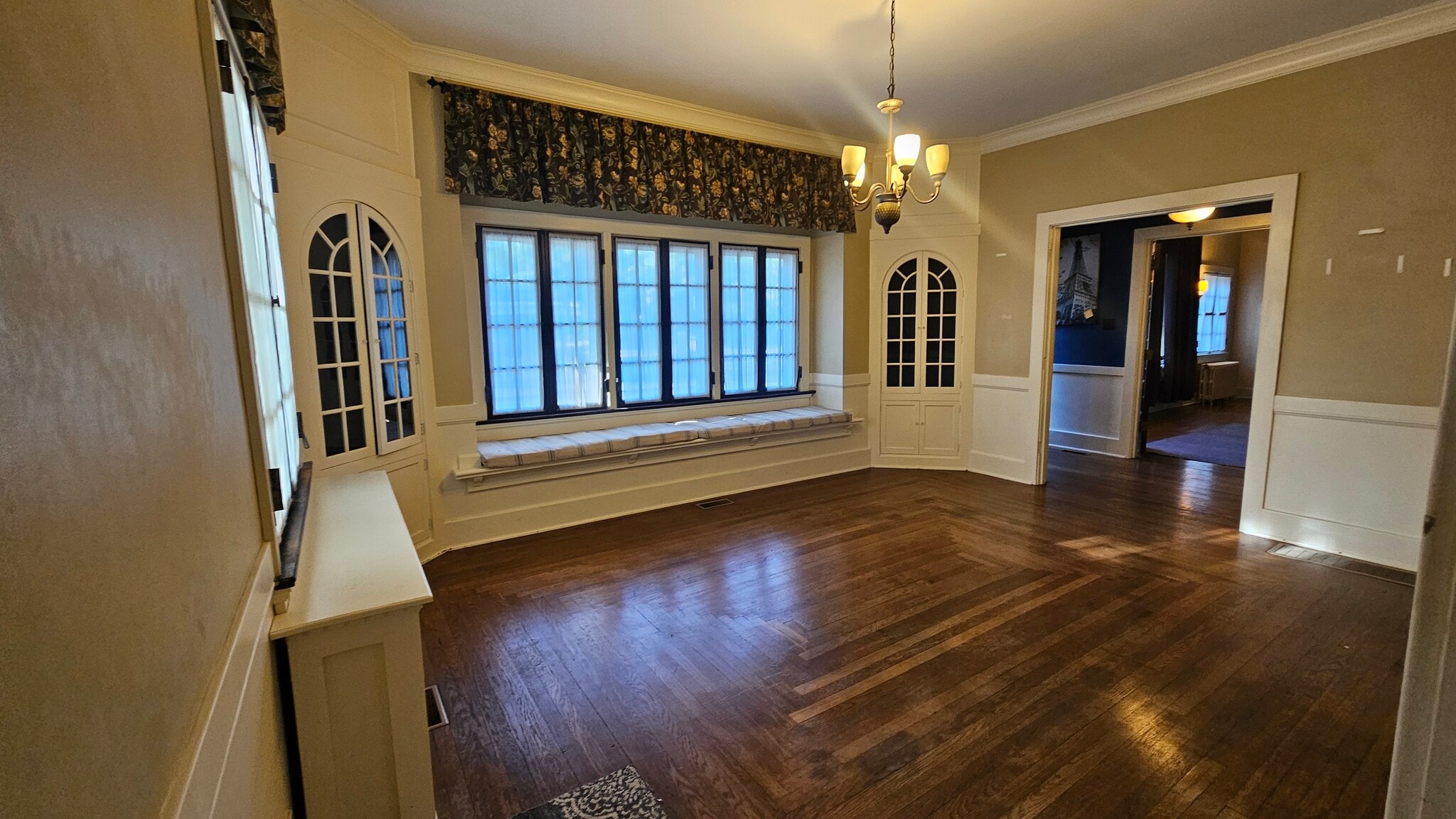 large dining room with builtins and custom window seat - 10 Park Ave