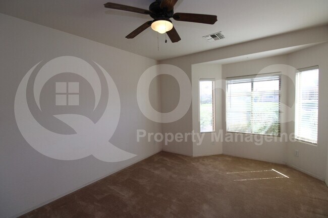 Building Photo - 42599 W Candyland Pl
