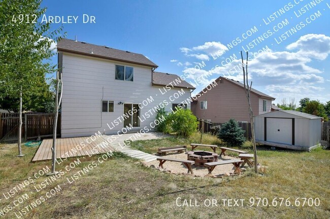 Building Photo - Bright Home with HUGE Yard!