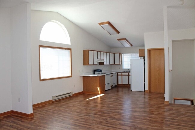 Building Photo - Desirable End-Unit Two-Bedroom Townhome wi...