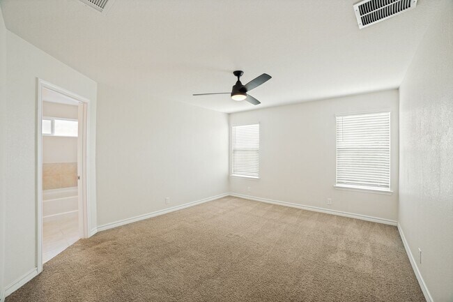Building Photo - Welcome home to this 4/2/2 nestled in Whisper Falls
