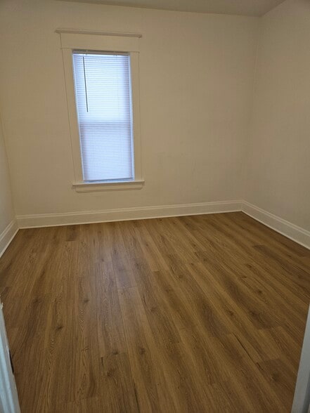 Bedroom One with Closet - 5706 22nd Ave