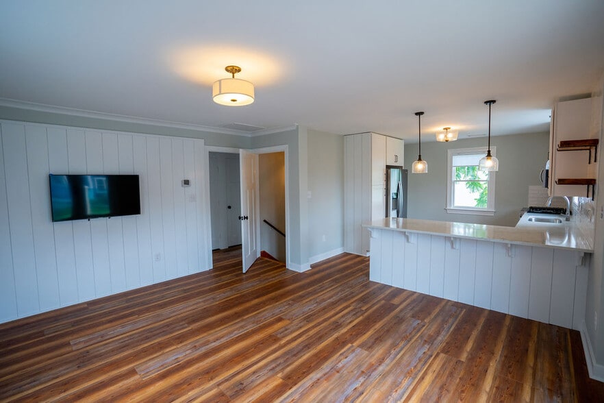 living area with flat screen tv - 610 Montrose Avenue Apt B