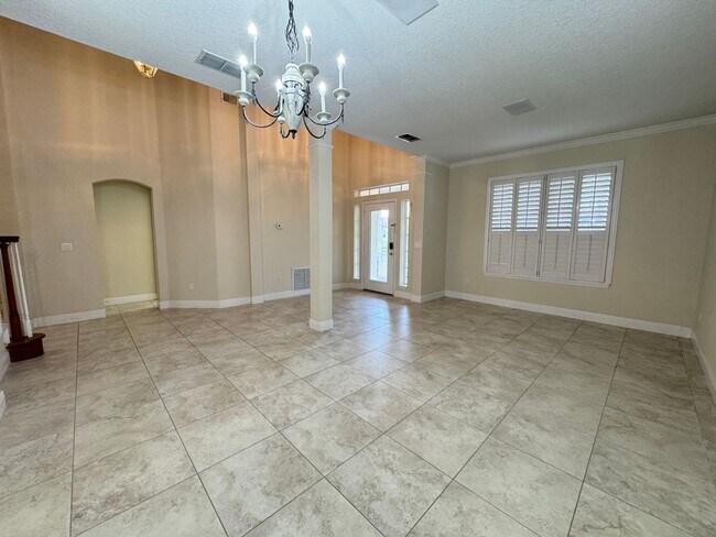 Building Photo - Spacious 4-Bedroom Home with Private Pool and Modern Comforts