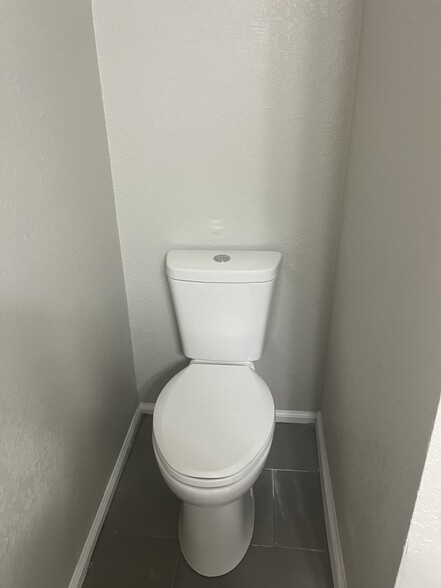 Upstairs toilet - 791 Assisi Ln