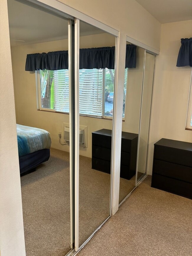 Building Photo - Move-In Ready 2BR/2BA Condo – Fully Furnished, AC, Washer/Dryer, 2 Parking stalls