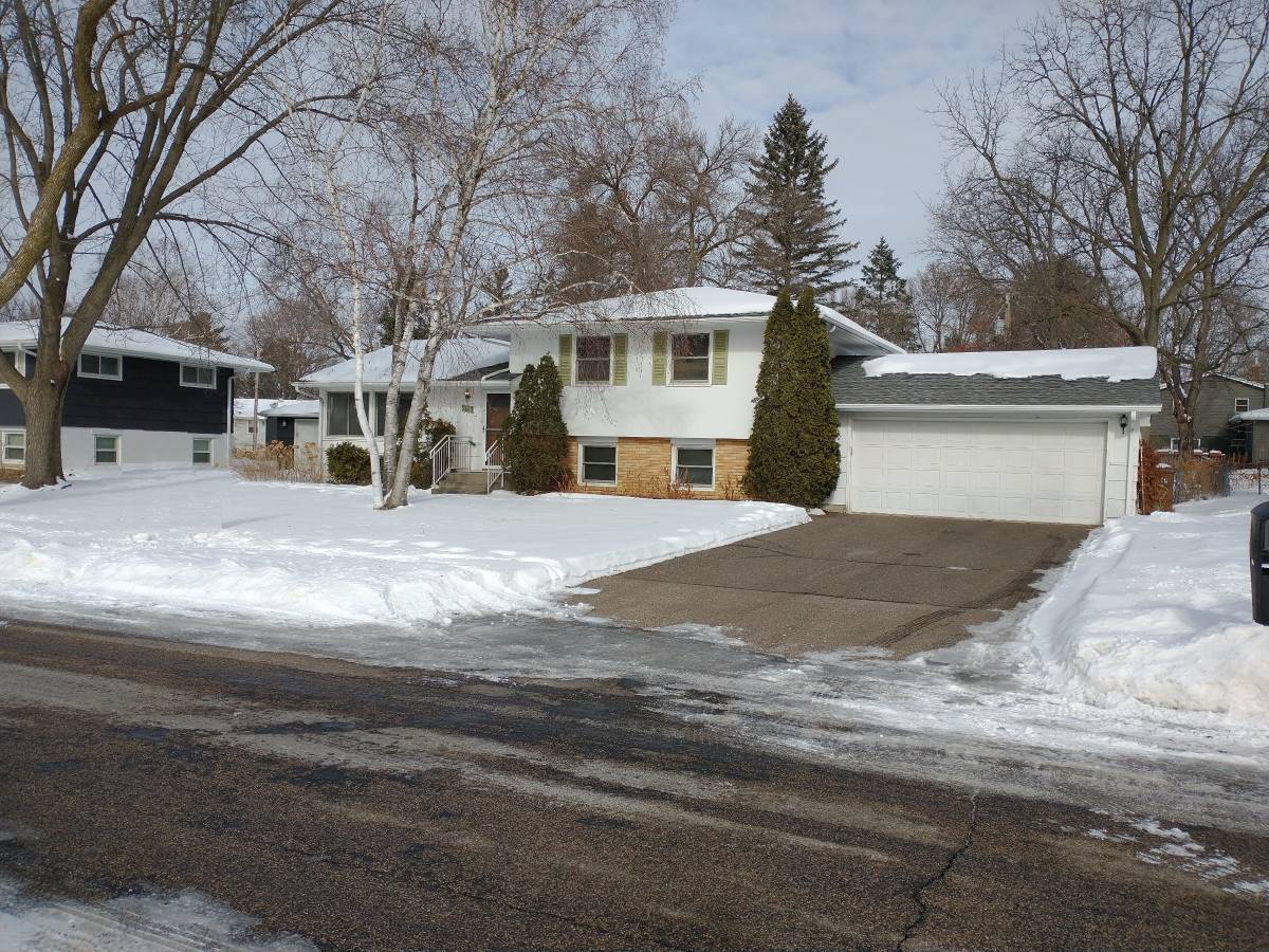 Front of the house - Left windows are the living room - Upper windows are 2 of the 3 upper level bedrooms - Lower windows are the family room - 2163 Randy Ave