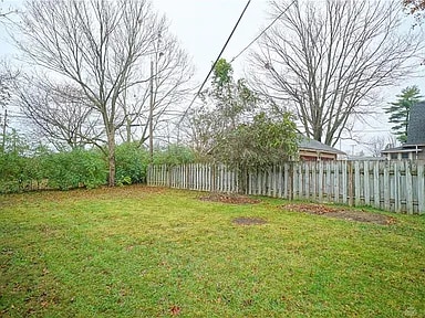 Plenty of fenced space for play and a garden - 703 N Central Ave
