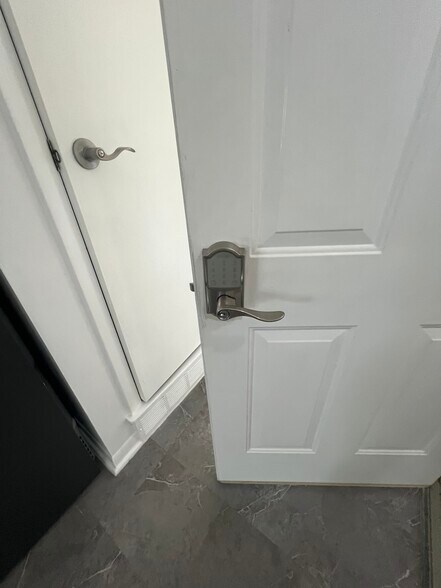 Coded doors - 119 W Swain St