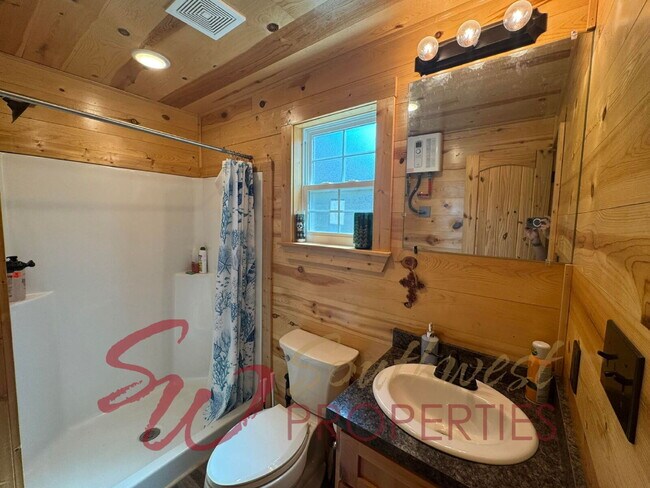 Building Photo - Escape to a peaceful, private retreat for one in this studio cabin!