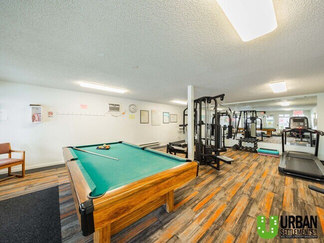 Building Photo - Comfortable 1-Bedroom Condo with Parking & Resort-Style Amenities