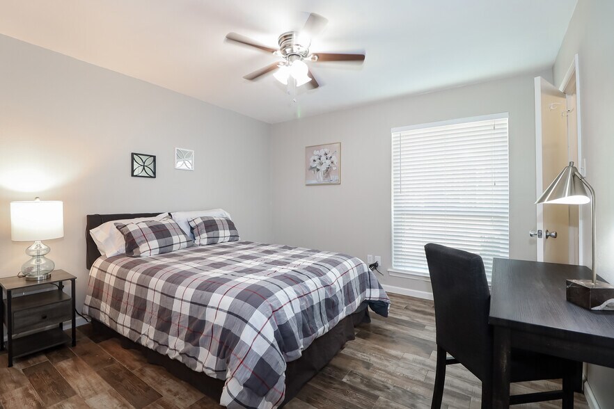 Queen room 2 has the same type of new mattress and adjustable base as queen room 1. The nightstand c - 2507 Holt Road
