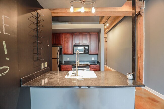 Building Photo - Live in Style at Old Manchester Lofts!