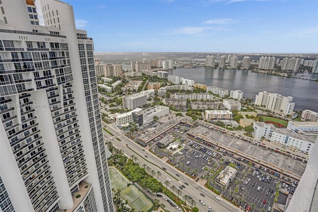 Building Photo - 18201 Collins Ave