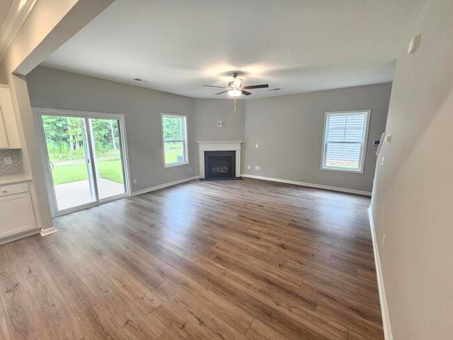 Building Photo - 1 year old 5 bedroom home w community pool!